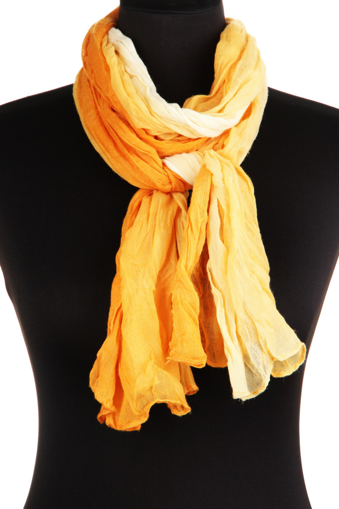 Mannequin wearing scarf isolated on white