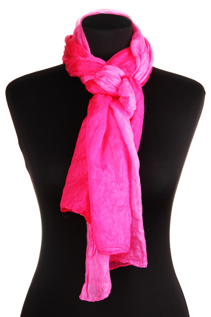Mannequin wearing scarf isolated on white
