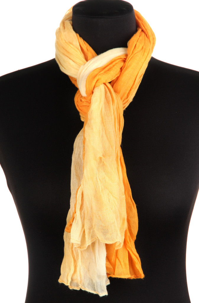 Mannequin wearing scarf isolated on white