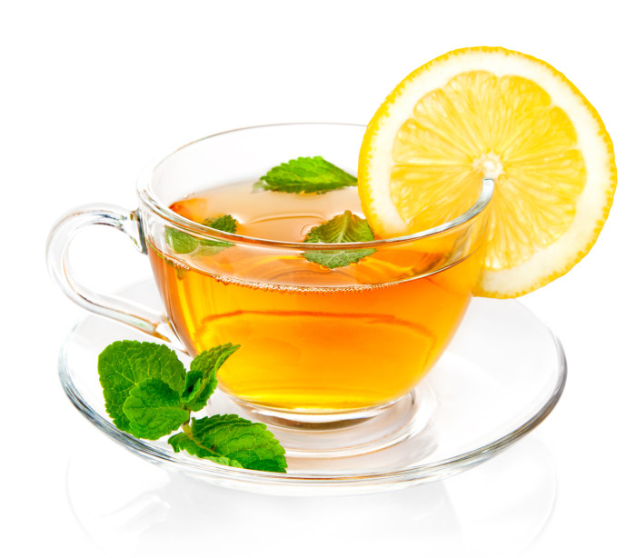 tea in cup with leaf mint and lemon